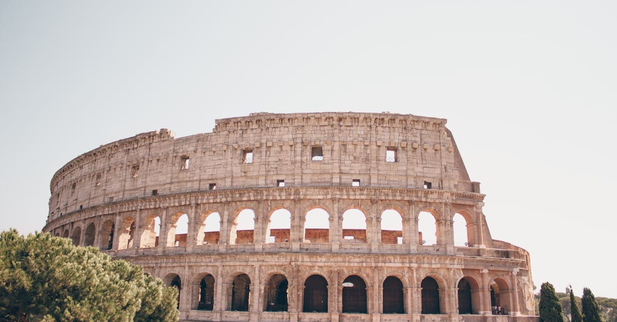 Stunning view of the Colosseum in Rome, showcasing its ancient architecture and historical significance.