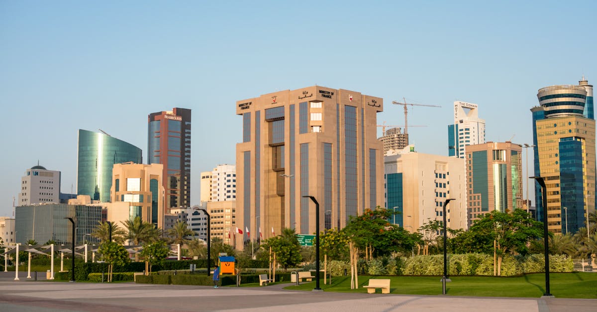 Skyline view of Bahrain's Diplomatic Area showcasing modern architecture and skyscrapers under a clear day sky.