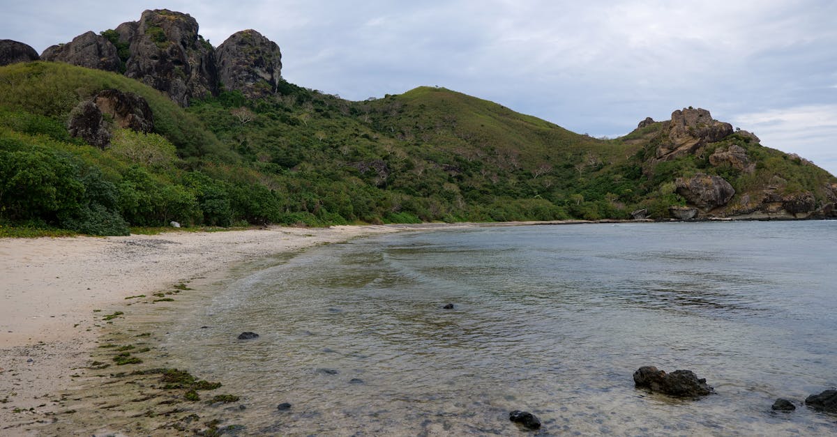 Explore the tranquil beaches of Yasawa Islands, Fiji, with lush landscapes.