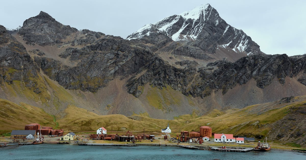 Scenic view of Grytviken harbor with mountains in South Georgia.