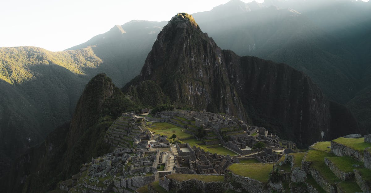 Experience the breathtaking beauty of Machu Picchu at sunrise, a UNESCO World Heritage Site in Peru.