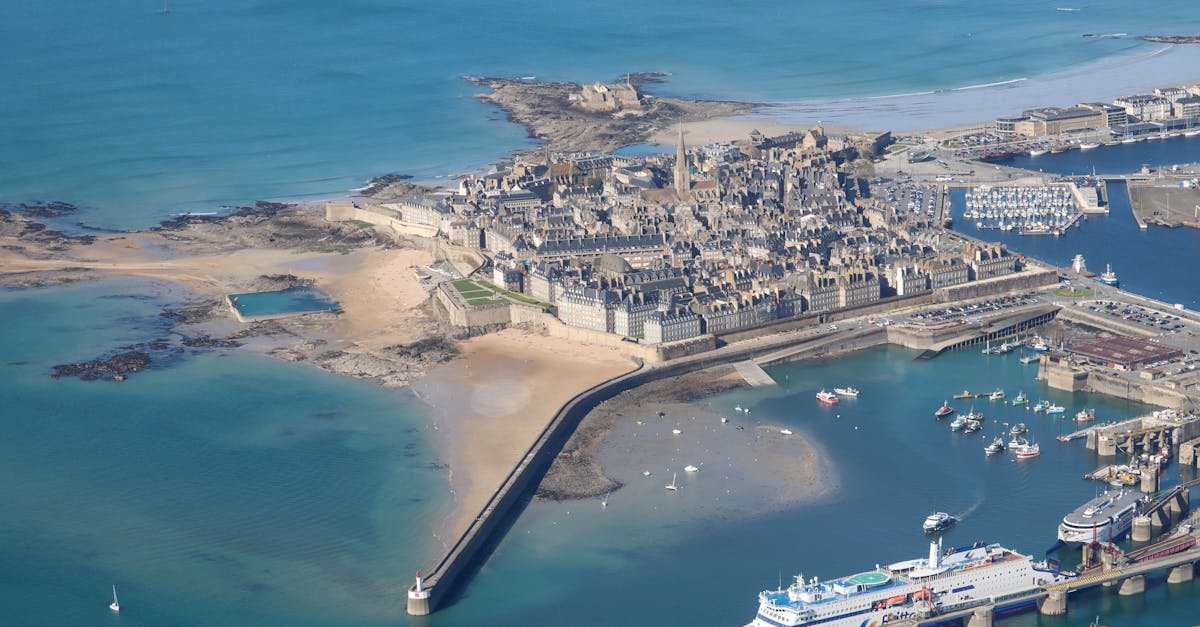 Discover the stunning aerial view of Saint-Malo, France's iconic walled city and bustling coastline.