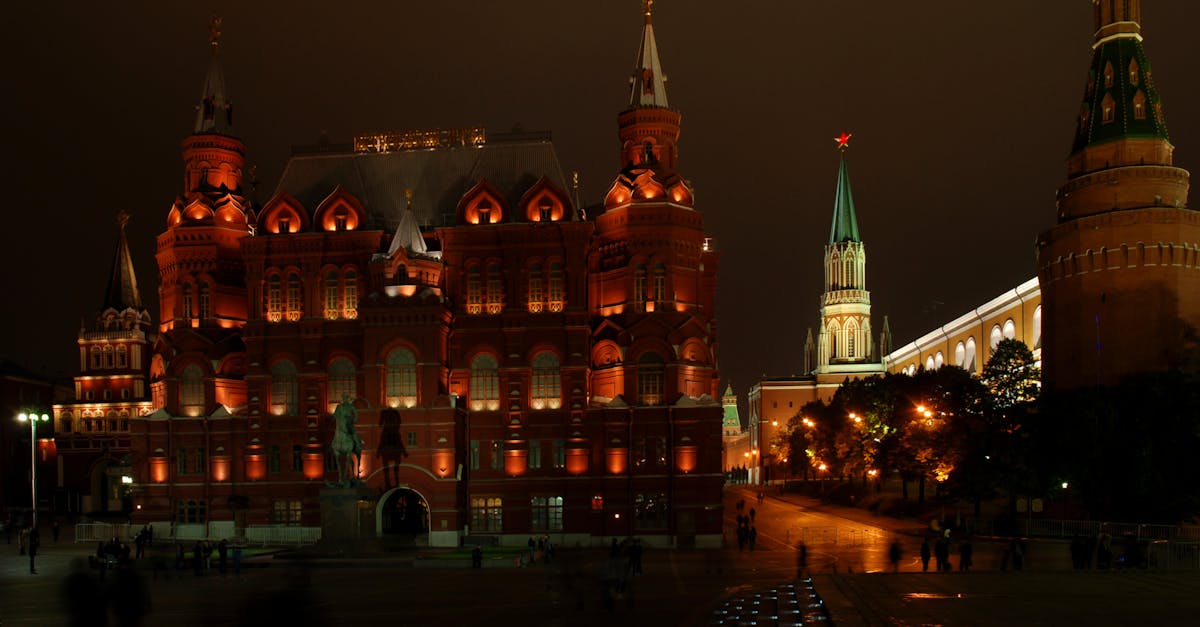 Night view of the illuminated Red Square and State Historical Museum in Moscow, Russia.