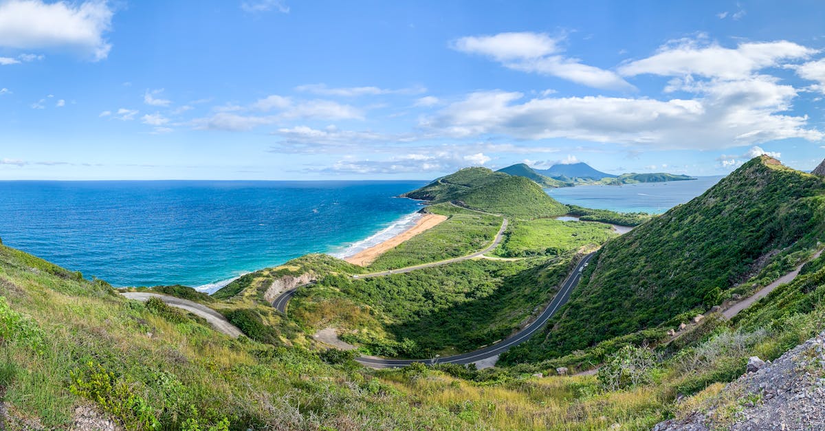 Breathtaking panoramic view of Saint Kitts lush coastline and vibrant ocean.