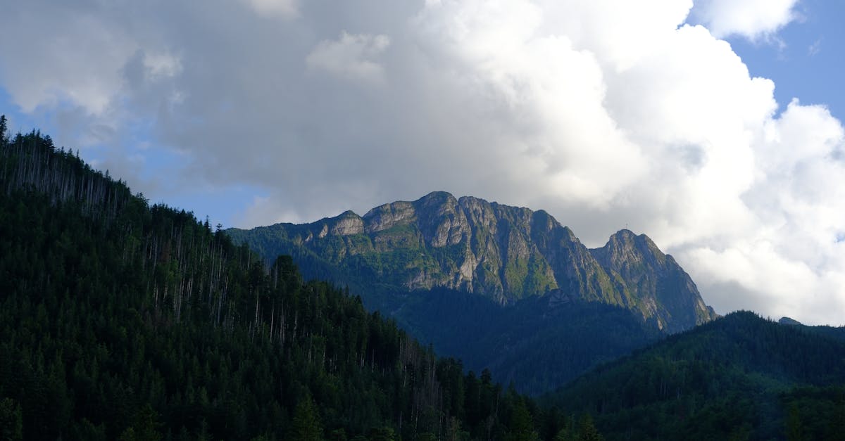 Breathtaking view of Vysoké Tatry mountains under dramatic clouds.