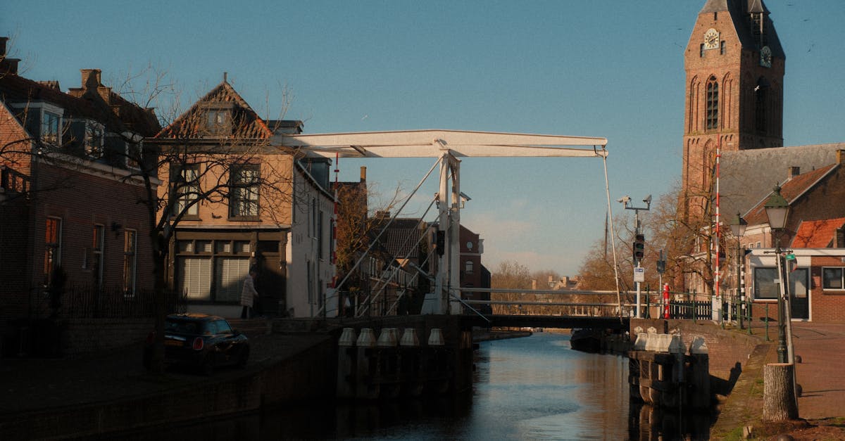 Picturesque view of a canal and historic church at Oudewater, Netherlands.