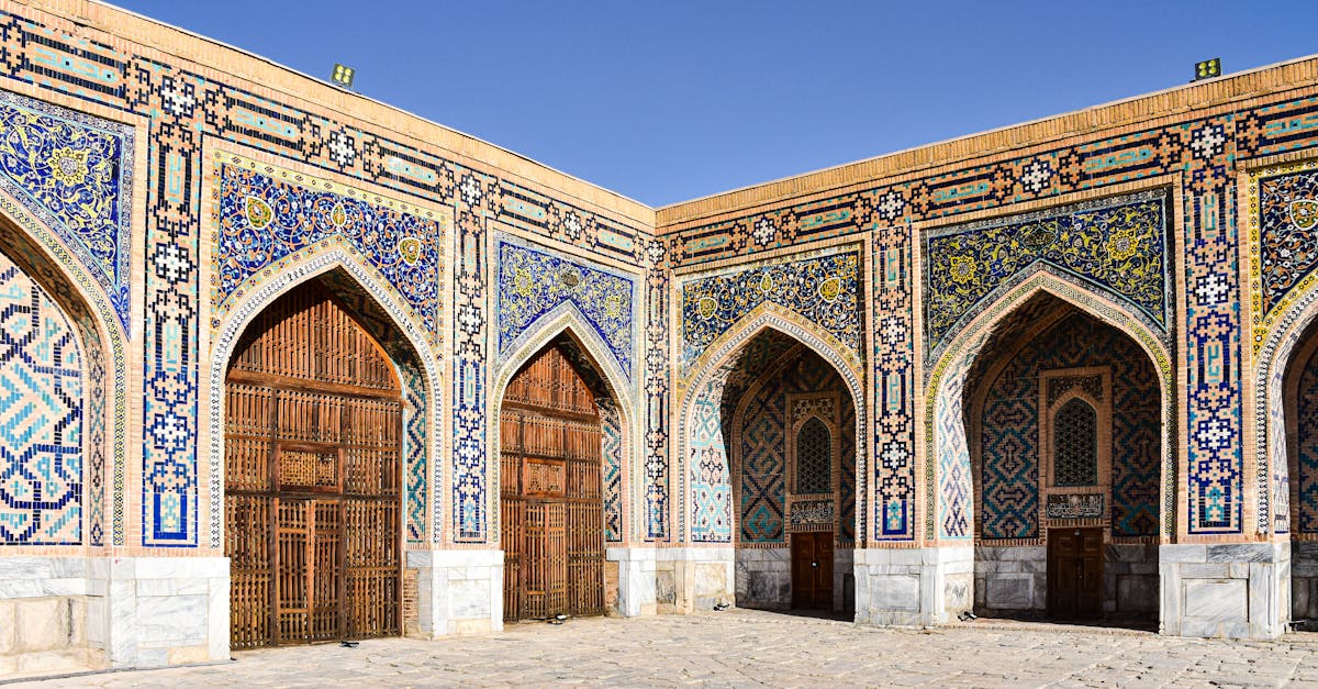 Beautiful courtyard view of Tilya-Kori Madrasa in Samarkand, showcasing stunning Islamic architecture.